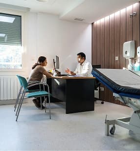Doctor consultation with patient in clinic office