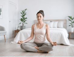 Beginner practising a simple seated yoga pose