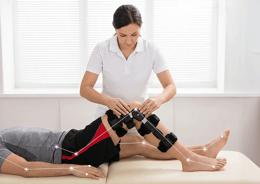Physiotherapist guiding a post-operative patient through rehabilitation exercises