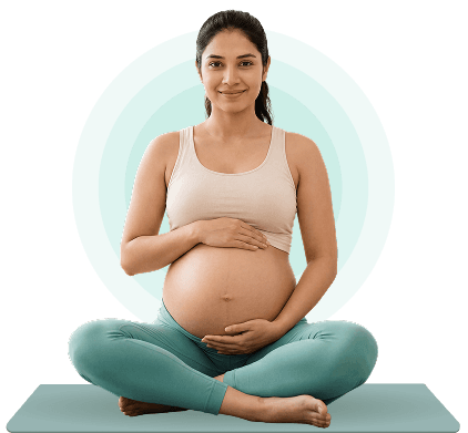 Expecting mother seated calmly, practising prenatal yoga at home